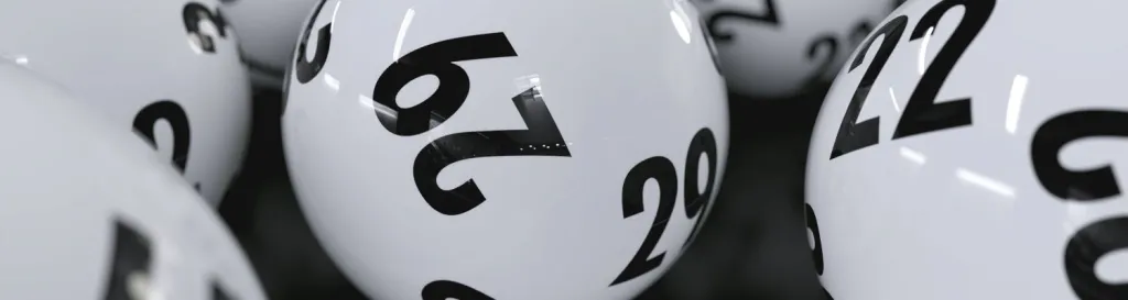 White lotto balls with black numbers